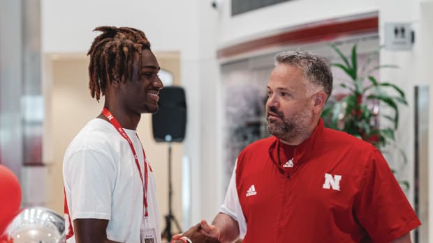 Evan Taylor with Nebraska head football coach Matt Rhule
